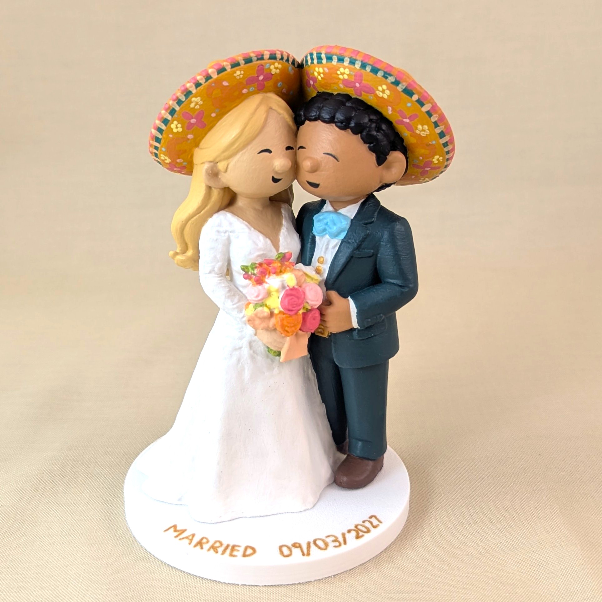 Custom made wedding topper of bride and groom, 3D printed and hand-painted